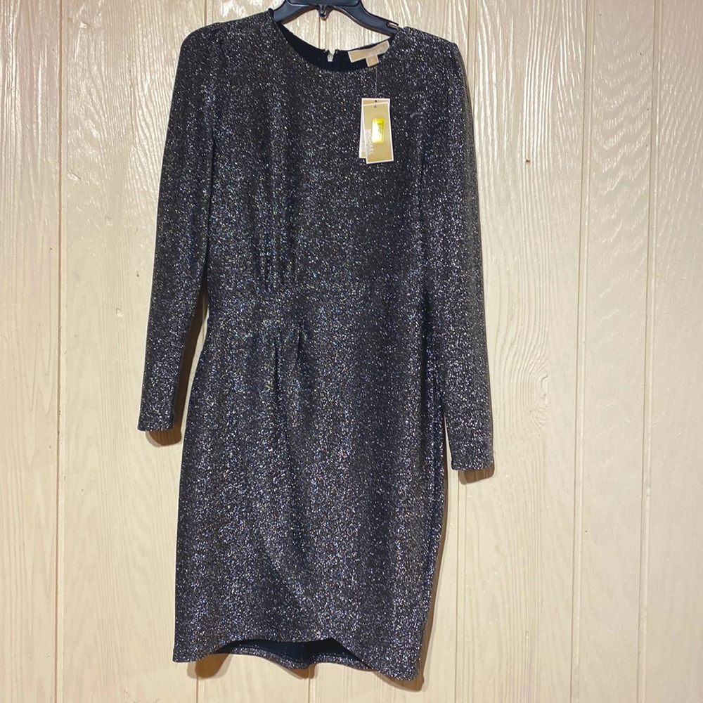 New Michael Kors dress, bought it at dillards store . It’s a beautiful dress.